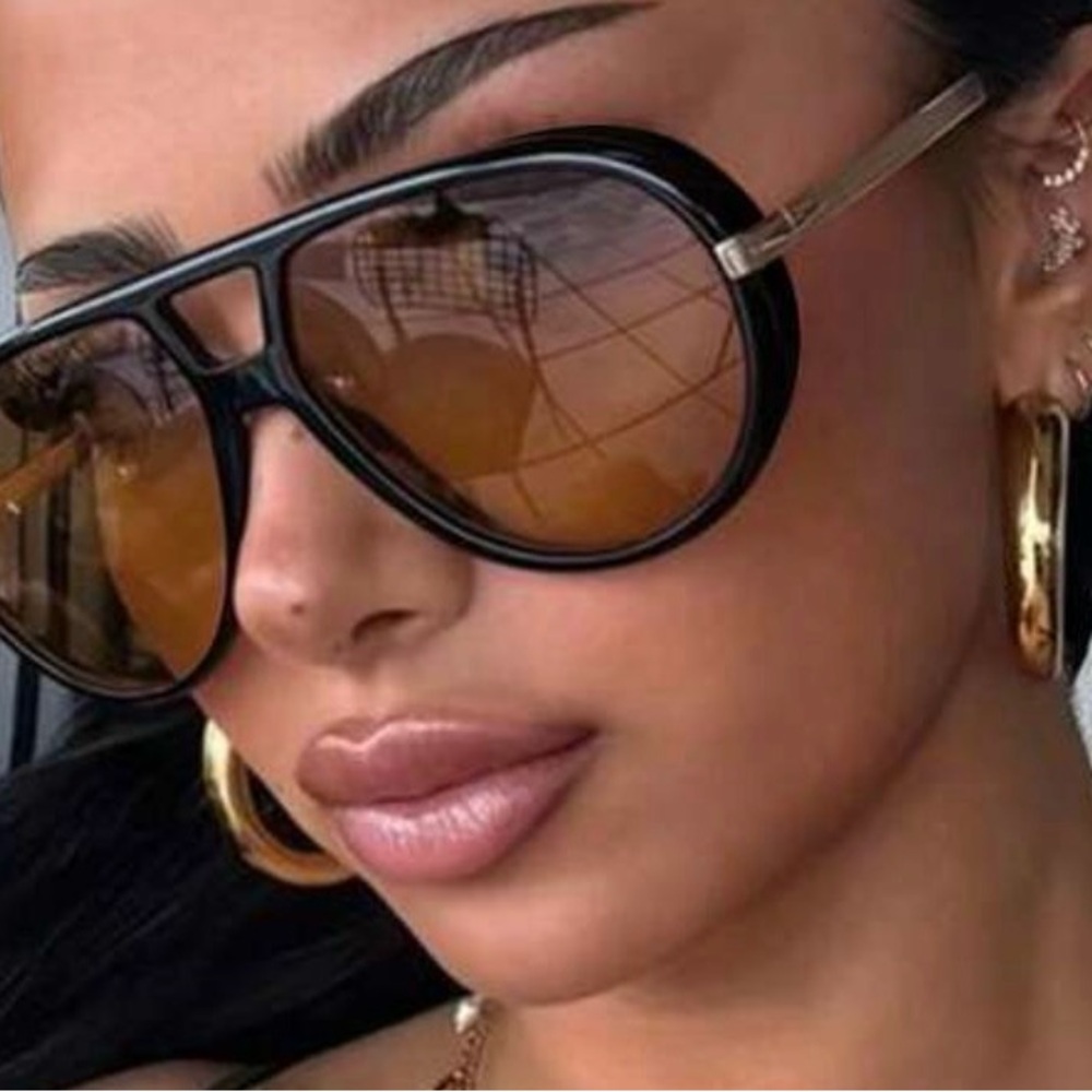 Aviator-Style Black Sunglasses with Amber Lenses